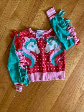 Well Worn Unicorn Holiday Sweater in Red, Pink, and Teal